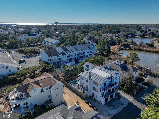 bird's eye view with a residential view and a water view