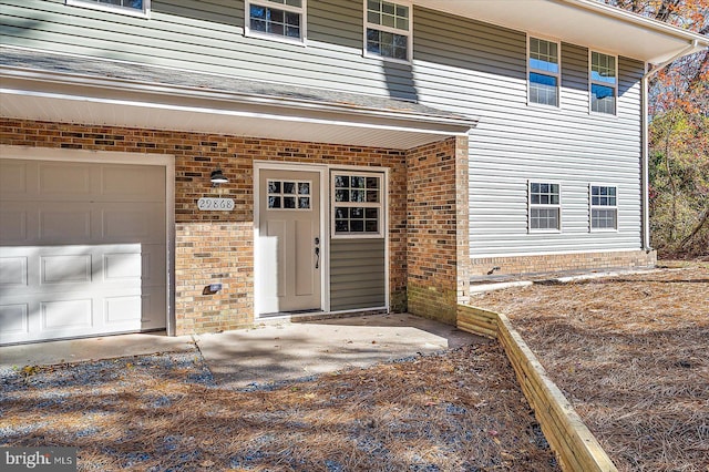 entrance to property with a garage