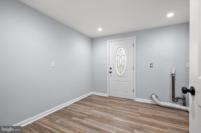 entryway with light hardwood / wood-style floors