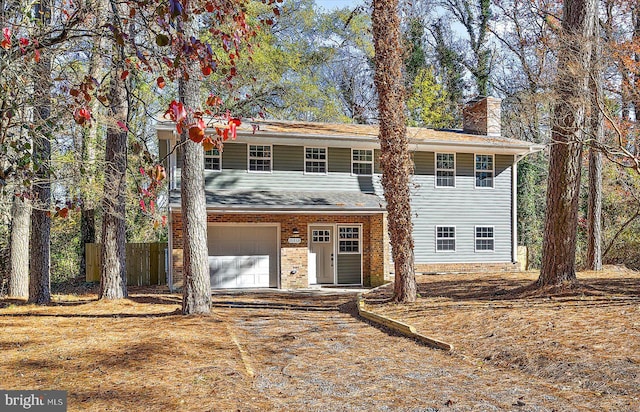 view of front of home with a garage