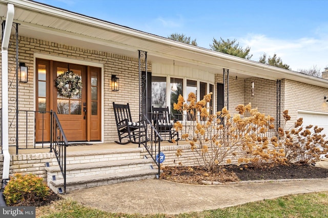 entrance to property with a porch