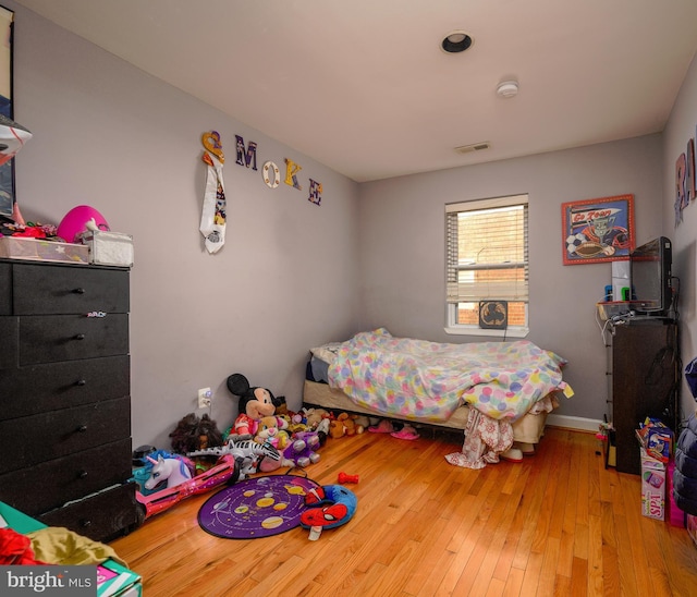 bedroom featuring light hardwood / wood-style floors