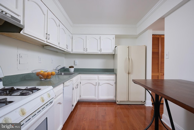 kitchen with sink, crown molding, white appliances, white cabinetry, and extractor fan