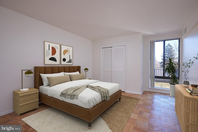 bedroom featuring parquet flooring and a closet