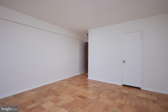 unfurnished bedroom featuring light parquet floors