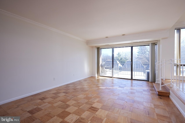 spare room featuring crown molding and light parquet flooring