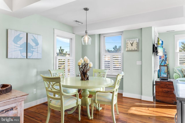 dining room with light wood-type flooring