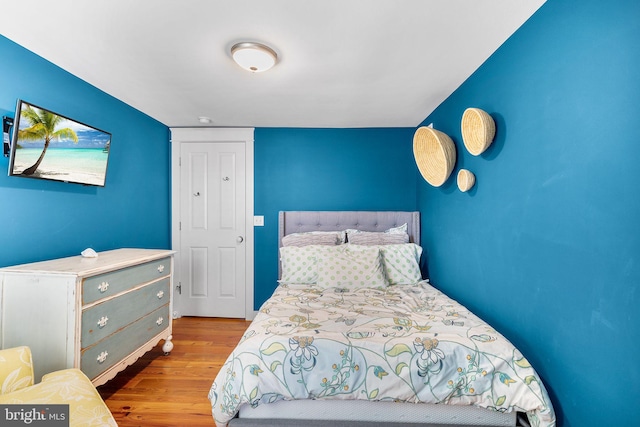 bedroom with light wood-type flooring