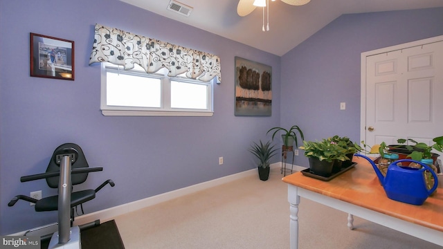 home office with carpet flooring, ceiling fan, and lofted ceiling