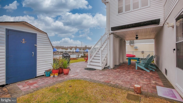 exterior space with a storage shed