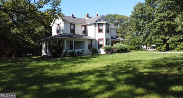 exterior space featuring a lawn