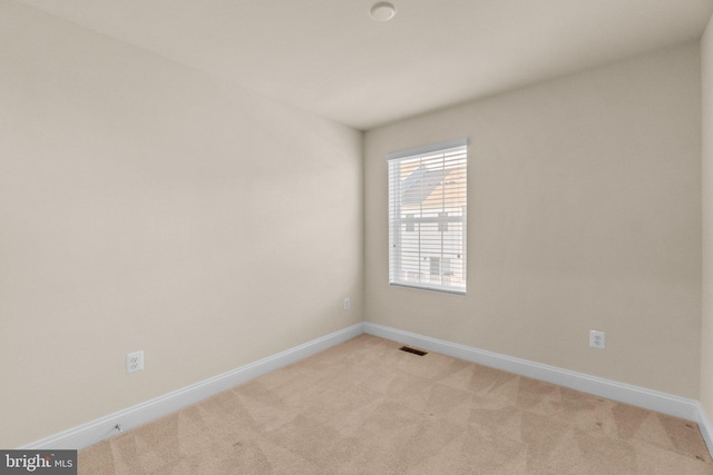 view of carpeted spare room