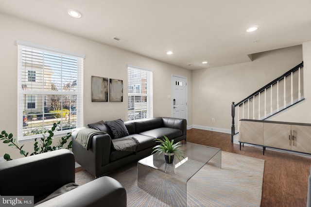 living room featuring dark hardwood / wood-style floors