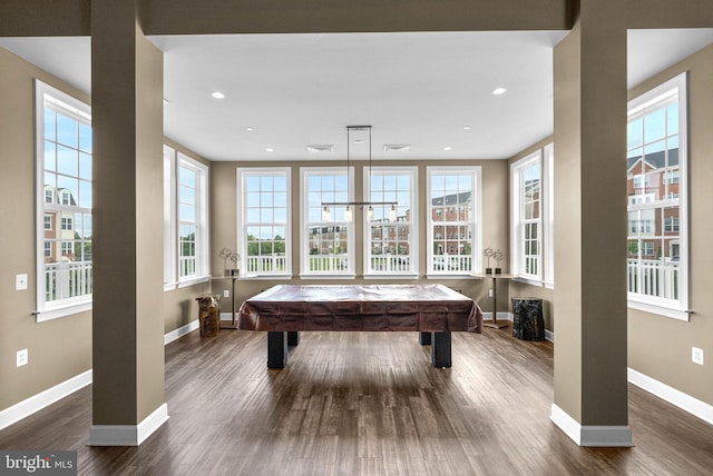 playroom with dark hardwood / wood-style flooring and billiards