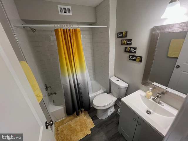 full bathroom with vanity, shower / bathtub combination with curtain, wood-type flooring, and toilet