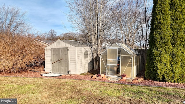 view of outbuilding with a lawn