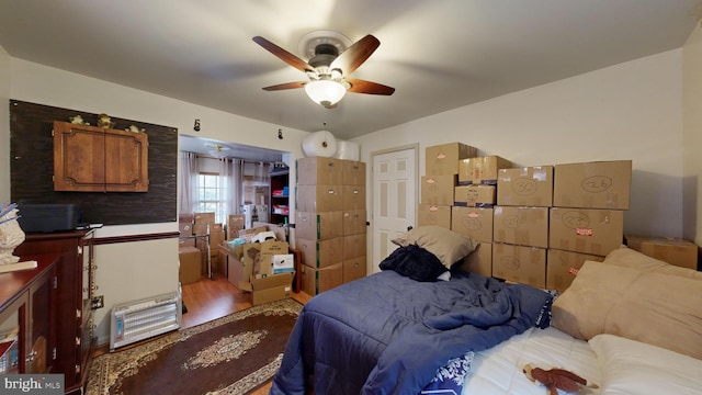 bedroom featuring ceiling fan and light hardwood / wood-style floors