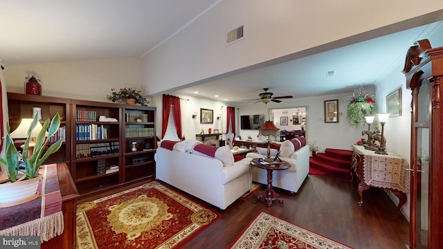 living room with dark hardwood / wood-style floors, vaulted ceiling, ceiling fan, and ornamental molding