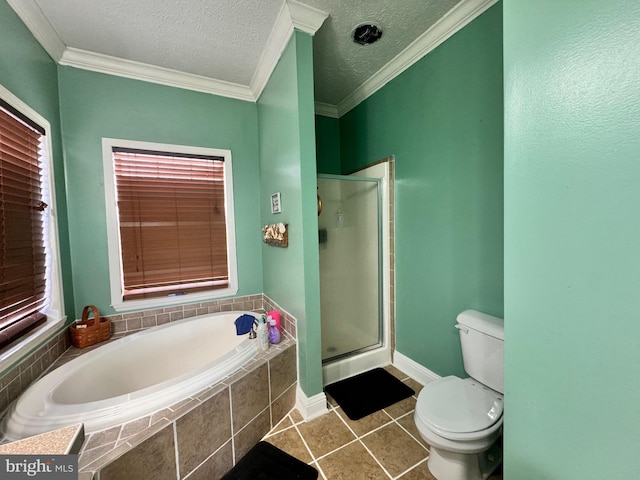 bathroom featuring tile patterned flooring, separate shower and tub, toilet, and crown molding