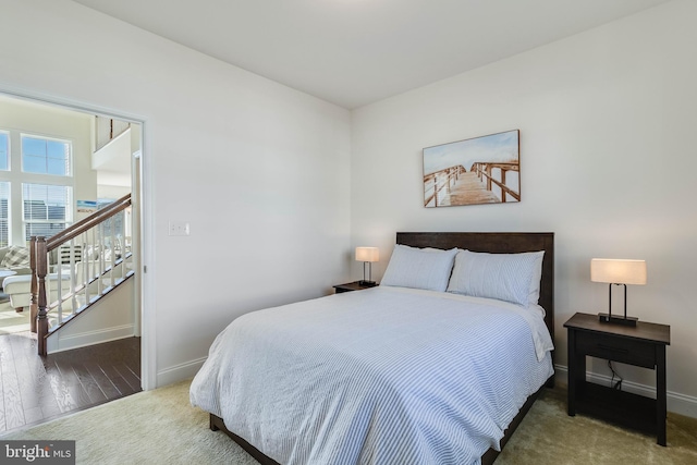 bedroom featuring dark hardwood / wood-style floors