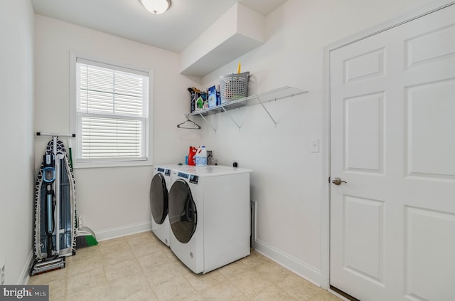 washroom with separate washer and dryer