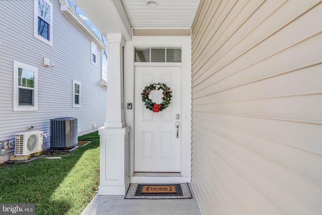 entrance to property with ac unit and cooling unit