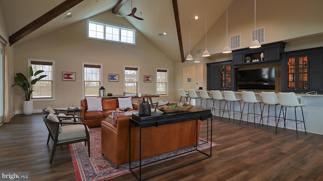 living room with beam ceiling, dark hardwood / wood-style flooring, high vaulted ceiling, and ceiling fan