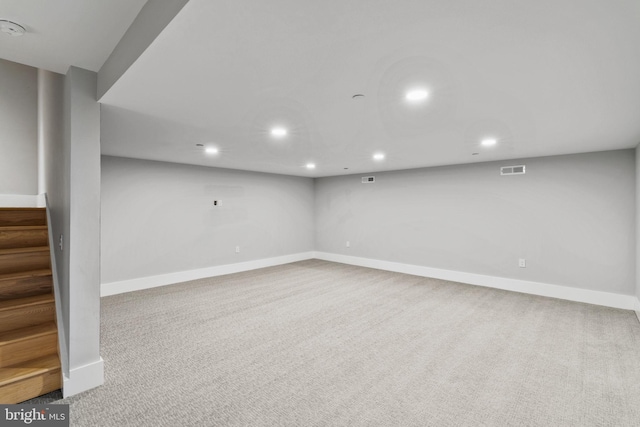 basement featuring carpet floors