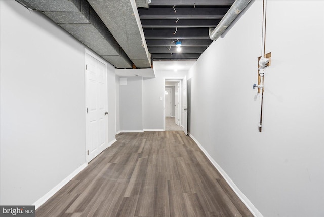 basement with wood-type flooring