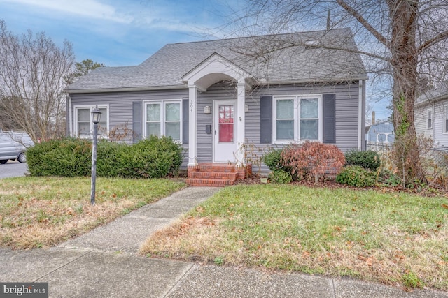 view of front of property with a front lawn