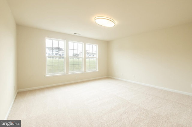 empty room with light carpet