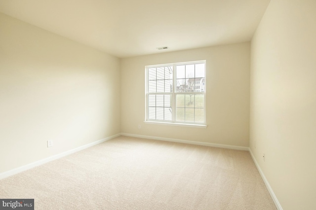 spare room with carpet flooring