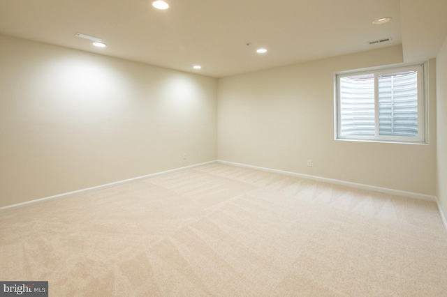 view of carpeted spare room