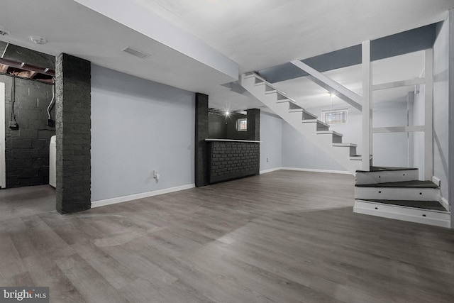 basement with wood-type flooring