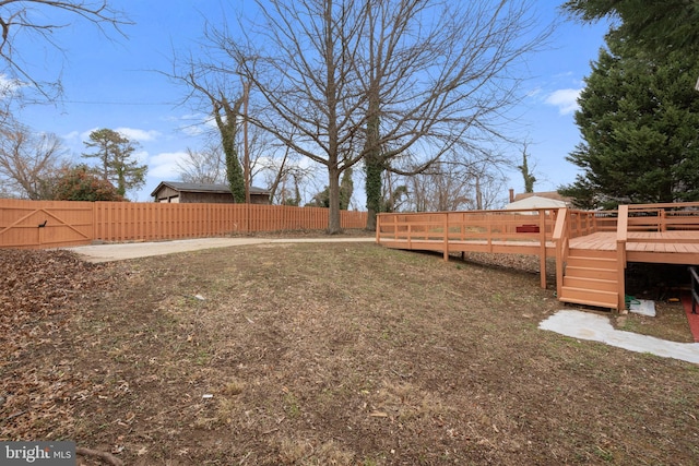 view of yard featuring a deck