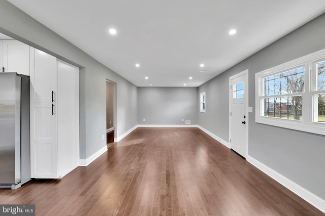 interior space with dark wood-type flooring