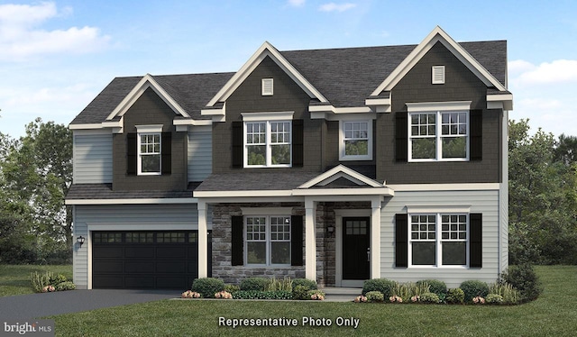 craftsman house featuring a front lawn and a garage