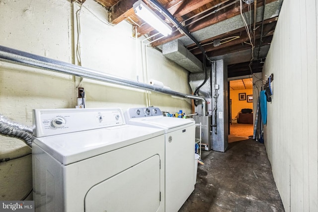 washroom featuring independent washer and dryer