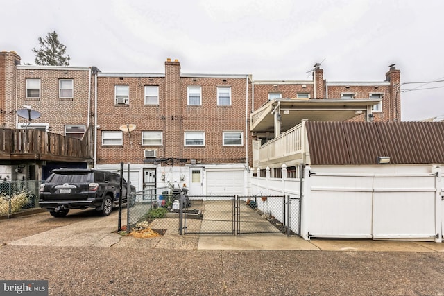 rear view of house with a balcony