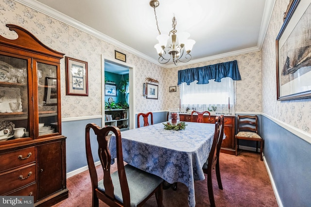 carpeted dining room with crown molding and an inviting chandelier