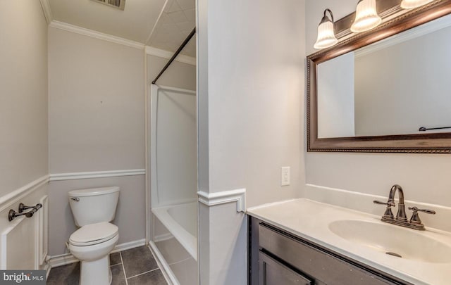 full bathroom with tile patterned floors, bathing tub / shower combination, toilet, vanity, and ornamental molding