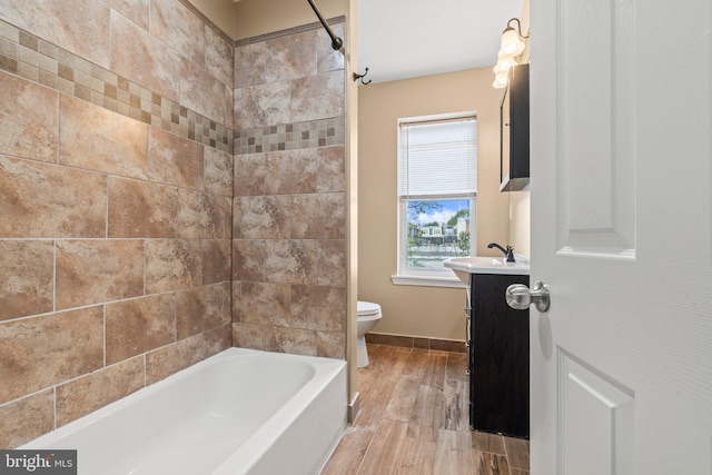 5738 Tulip St, Philadelphia, PA 19135 - bathroom featuring vanity, wood finished floors, and shower / tub combination