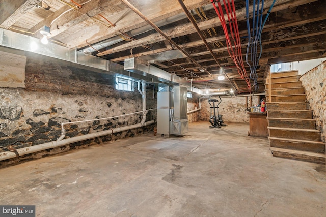 5738 Tulip St, Philadelphia, PA 19135 - below grade area featuring stairs and heating unit