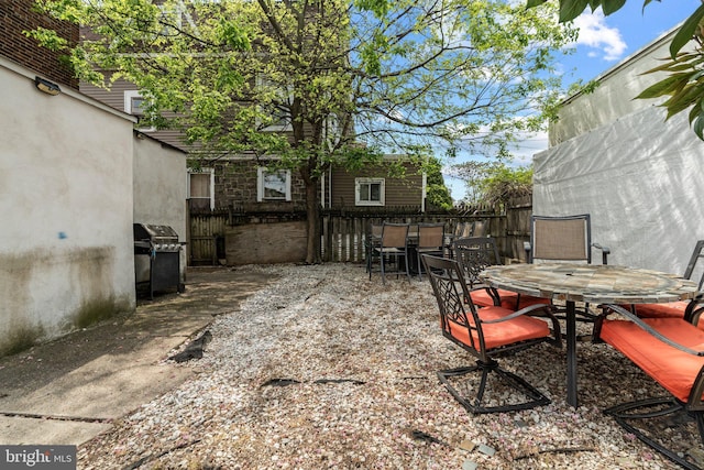 view of patio with a grill