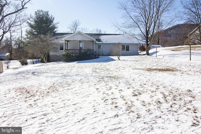 single story home featuring covered porch