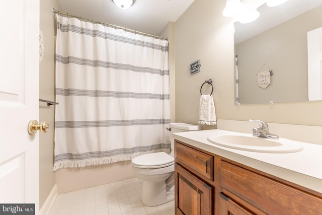 full bathroom with shower / tub combo with curtain, vanity, tile patterned floors, and toilet