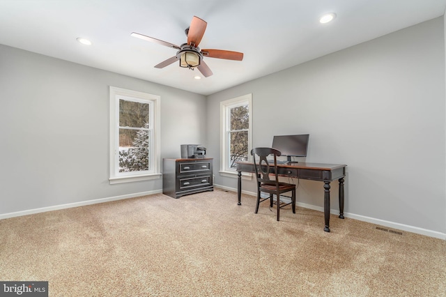 office area featuring carpet flooring and ceiling fan