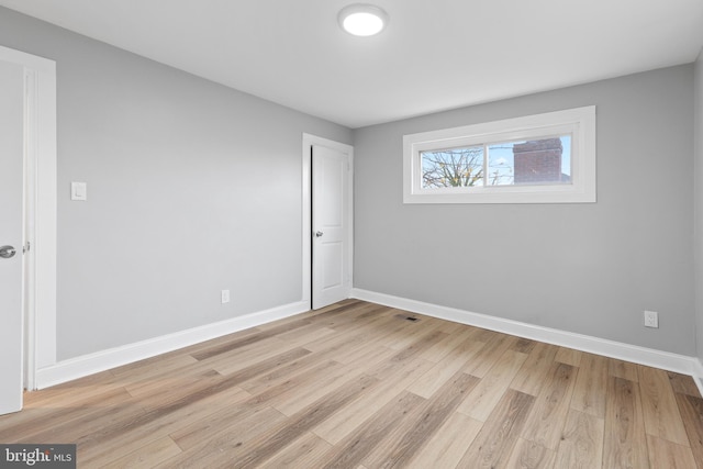 empty room featuring light wood-type flooring