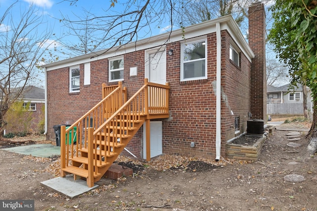 view of front of house with cooling unit