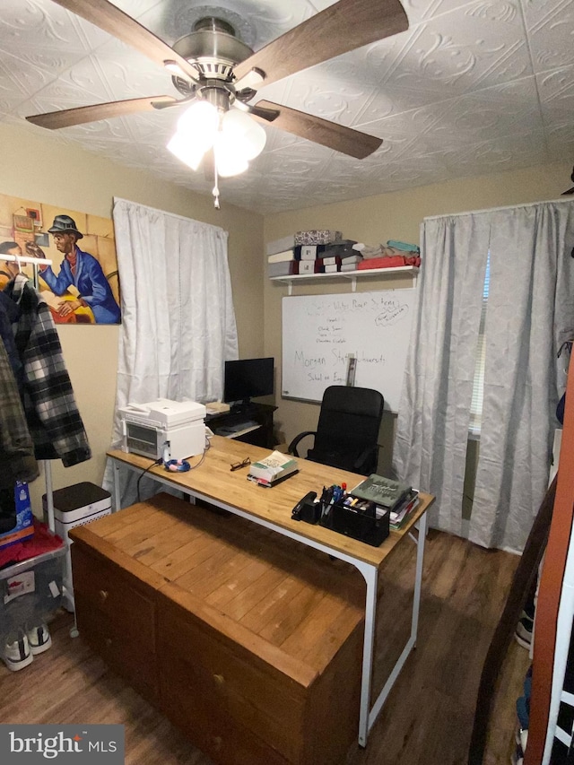 office featuring ceiling fan and dark wood-type flooring